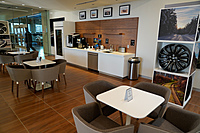 Jaguar/Land Rover Customer Lounge area with snack and beverage counter.