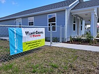 3.	Wesley Chapel Toyota sponsored a home with Habitat of Humanity. They conducted a home dedication event for the home owner to receive her keys.