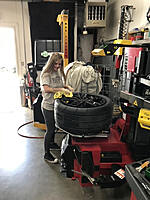 Cassie mounting up some tires.