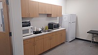 Break room microwave, toaster, refrigerator, sink, storage - cupboards