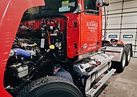 Another technician working on a truck. Our Manufacturer, ASE Trained and Certified Technicians work hard 24/7/365