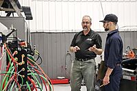 Our Training Director, Rob Lynds, giving a tour to a young technician in out Shrewsbury training facility
