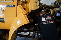 A technician working on a customers truck