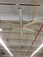 New industrial fans throughout the middle of the service shop